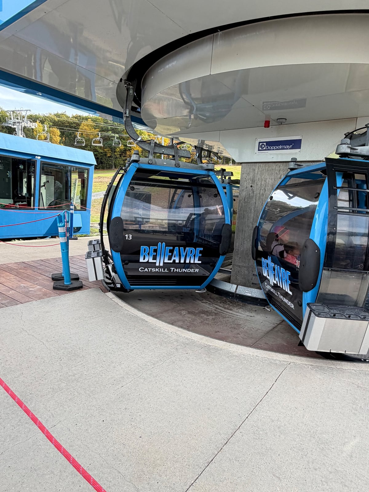 Blue Belleayre gondola cabins at the base station